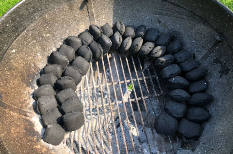 Two rows of cahrcoal briquettes