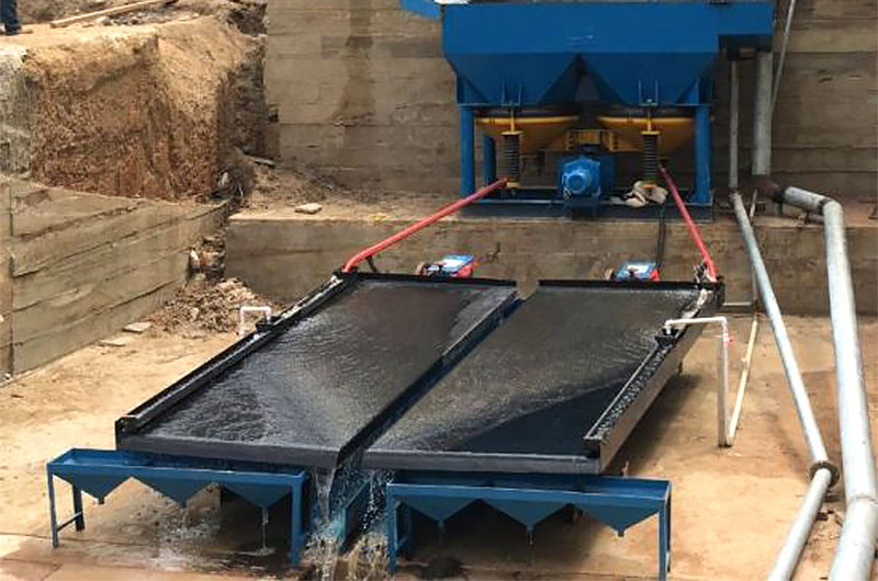 Separating gold from black sand using shaking tables