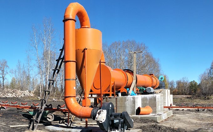 Converter sludge drying in rotating drum using hot steel balls